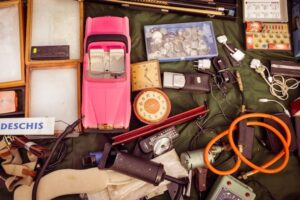 garage sale items displayed on table