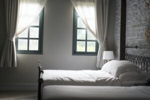 tidy minimalist bedroom is a restful escape