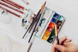 palette of paints on table in a multi-purpose space